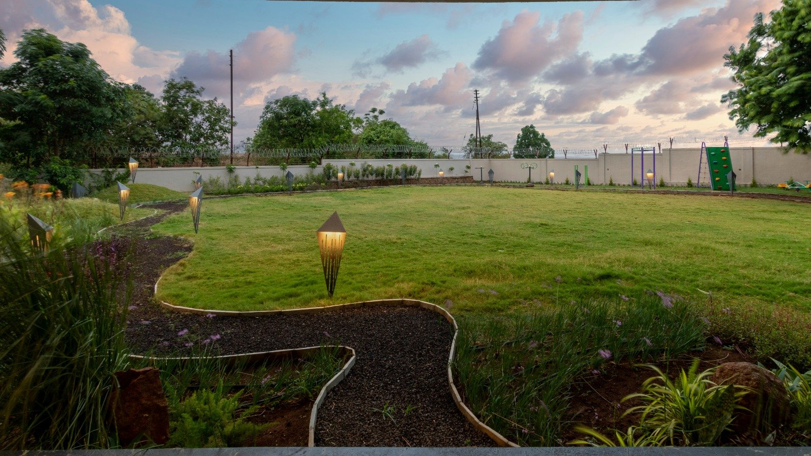 LAWN + BBQ – Lawn at golden hour, jogging track curving, BBQ smoke.